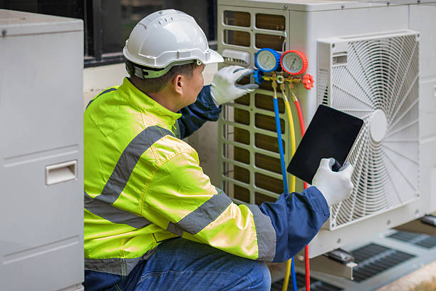 Professional Heat Pump Repair technician working in Kapaa, HI